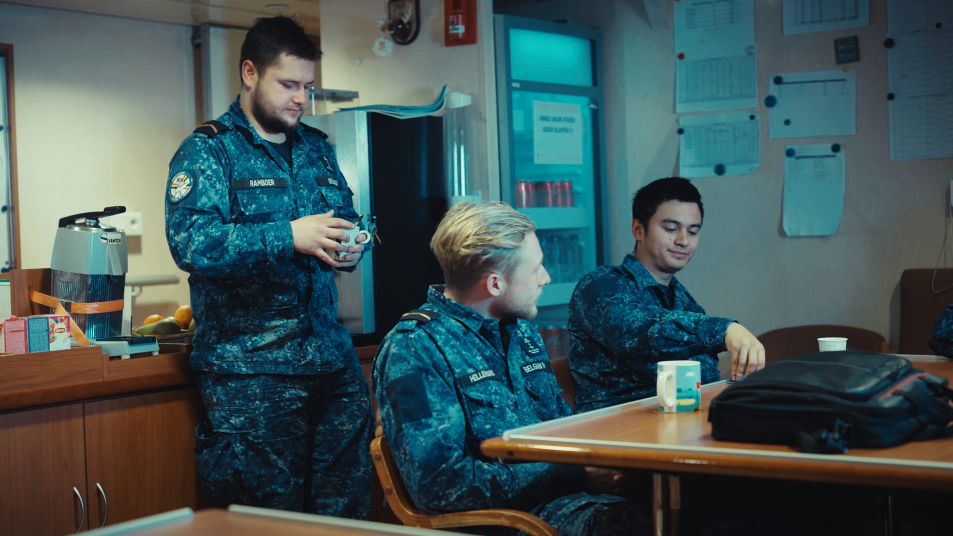 Three marines having a coffee break